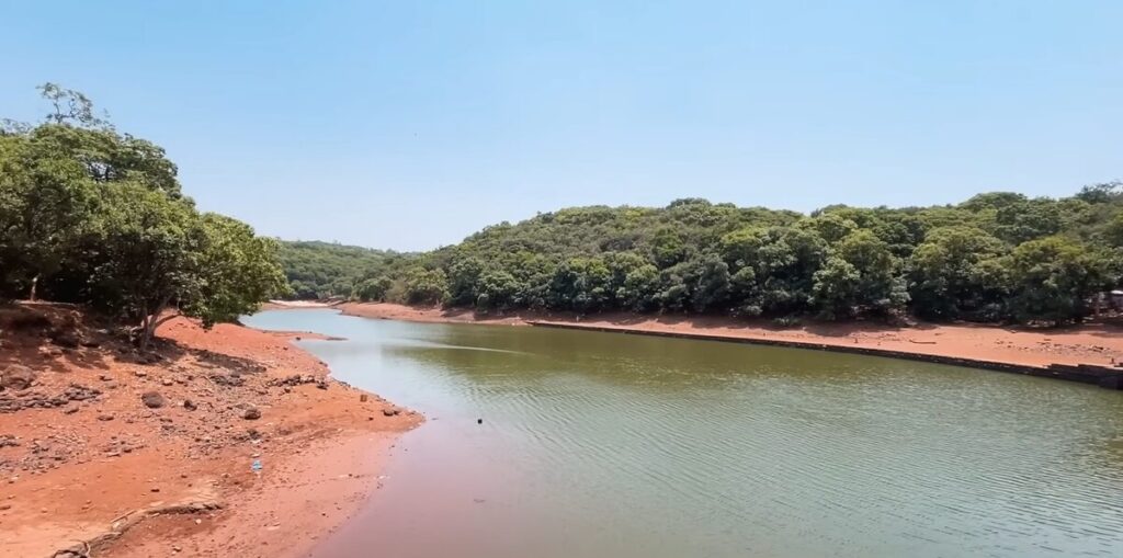 Charlotte Lake Matheran in monsoon with lush green hills