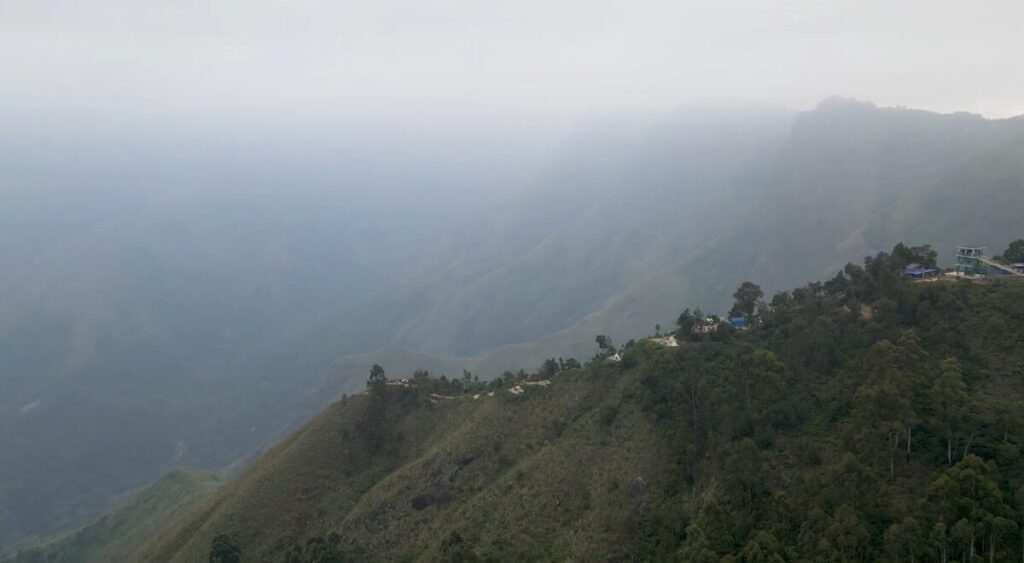 Panoramic valley view from Top Station in Munnar during sunset hours - Top Station