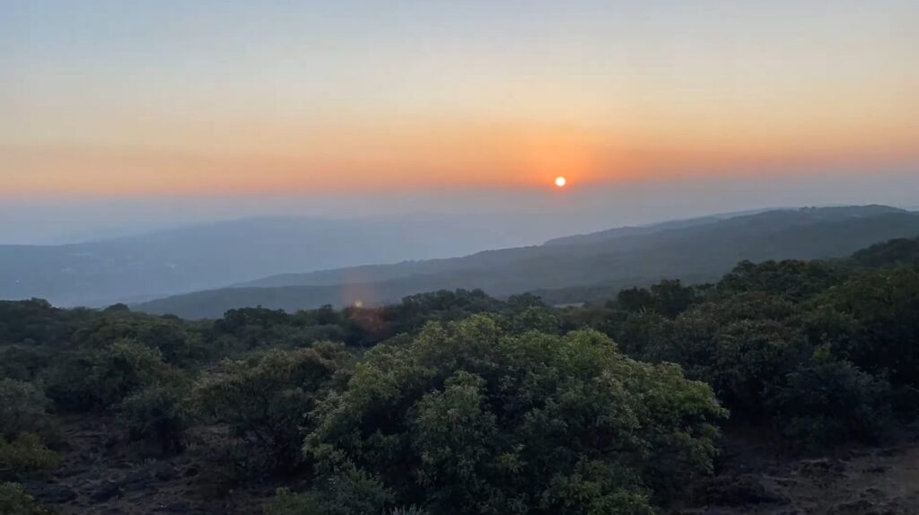 Beautiful mountain sunrise from Mahabaleshwar viewpoint with orange sky