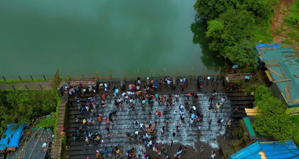 Bhushi Dam in Lonavala during monsoon with flowing water steps