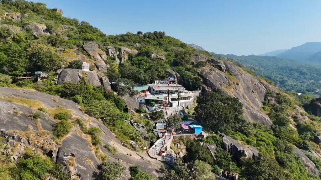 Hilltop view of Arbuda Devi Temple surrounded by rocky hills in Mount Abu