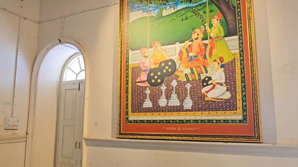 Traditional royal painting inside Sajjangarh Fort