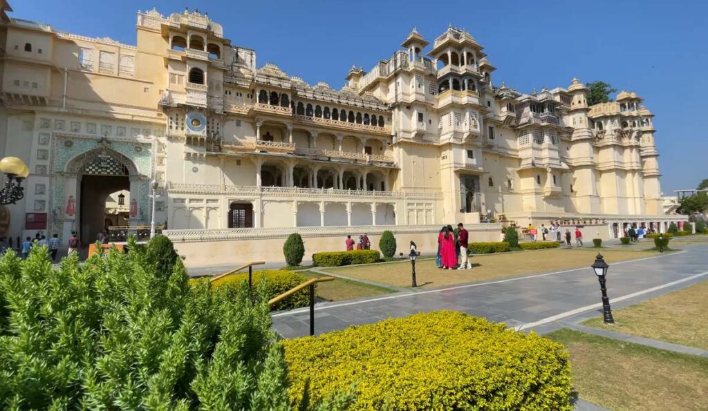 City Palace Udaipur exterior with traditional Rajasthani architecture and palace gardens